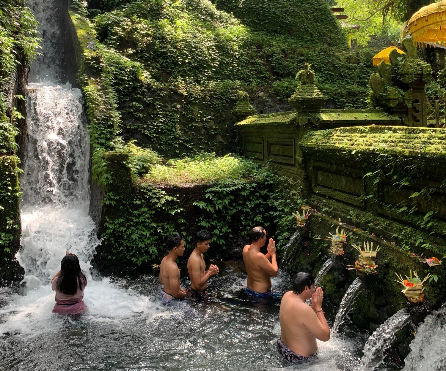 People purifying themselves in a Hindu temple
