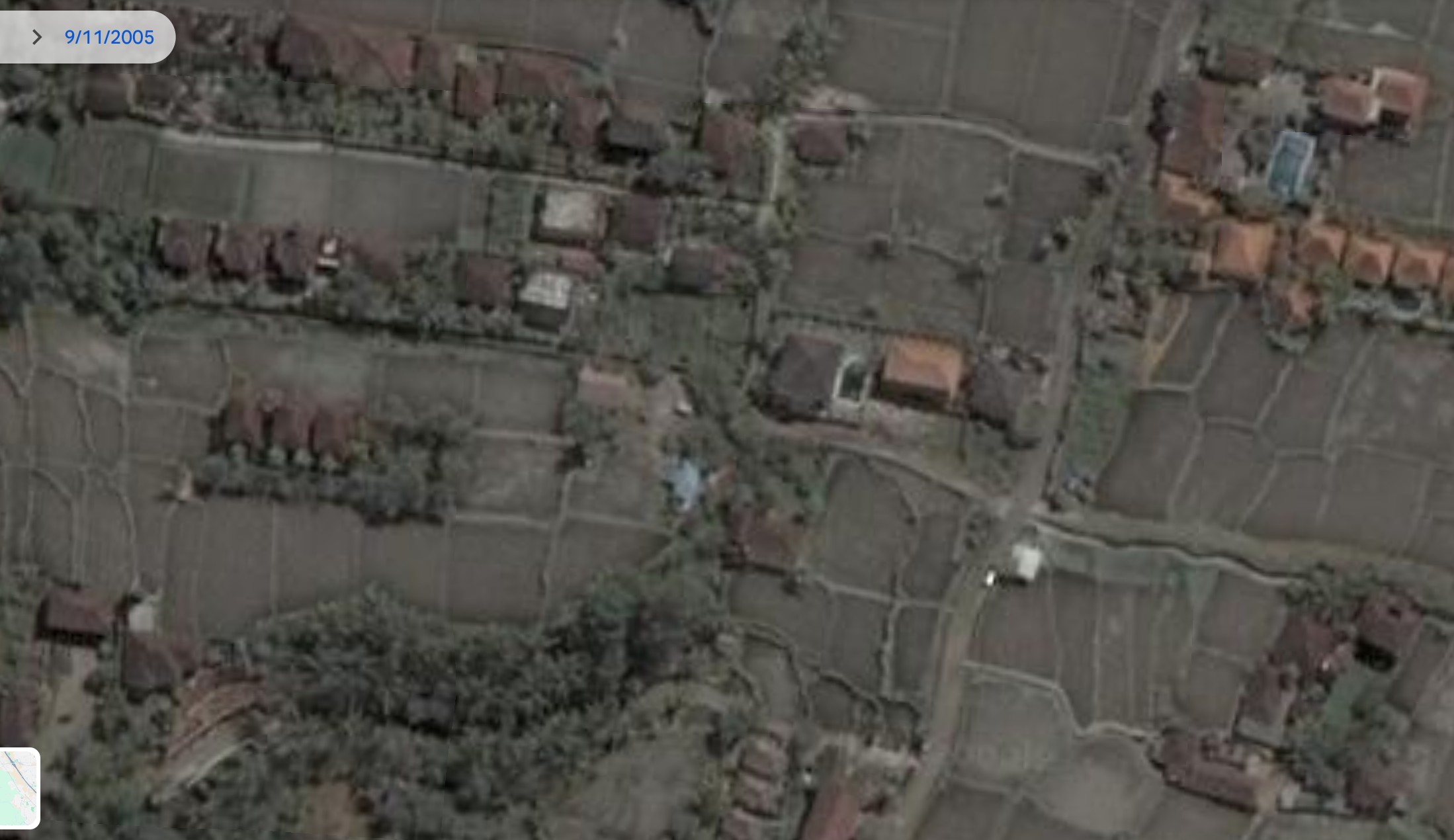Aerial view of rice terraces and a few family compounds near Ubud, Bali, in 2005